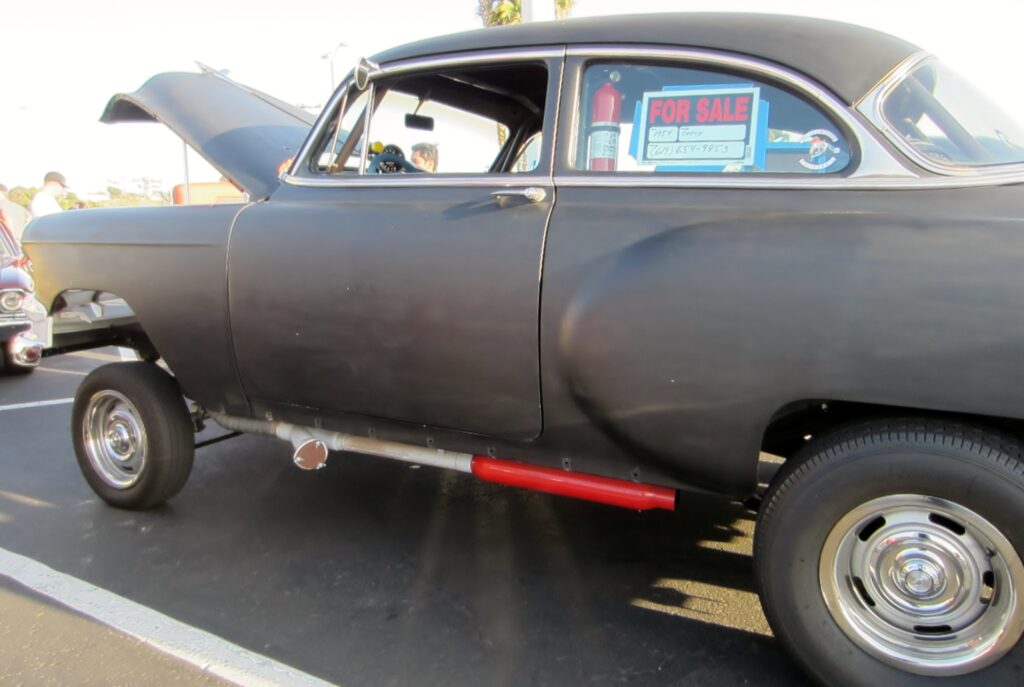 Tony's '54 Gasser. Straight front axle, Cherry Bombs and caged.