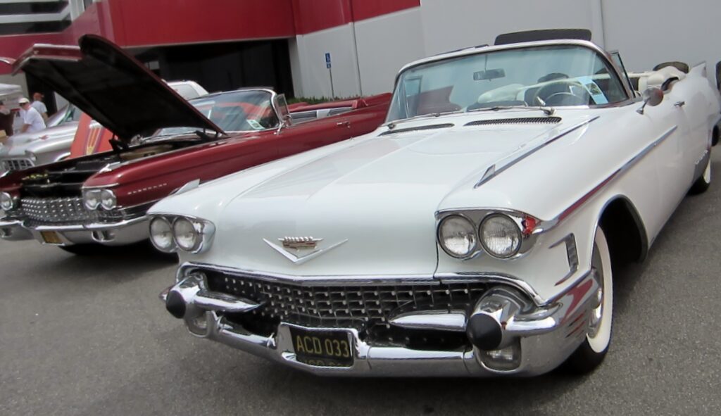 A brace of big Caddys in the VIP area.