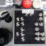 His jewelery designs.