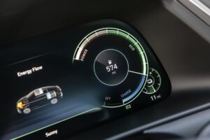 A digital mileage readout shows 574 miles 