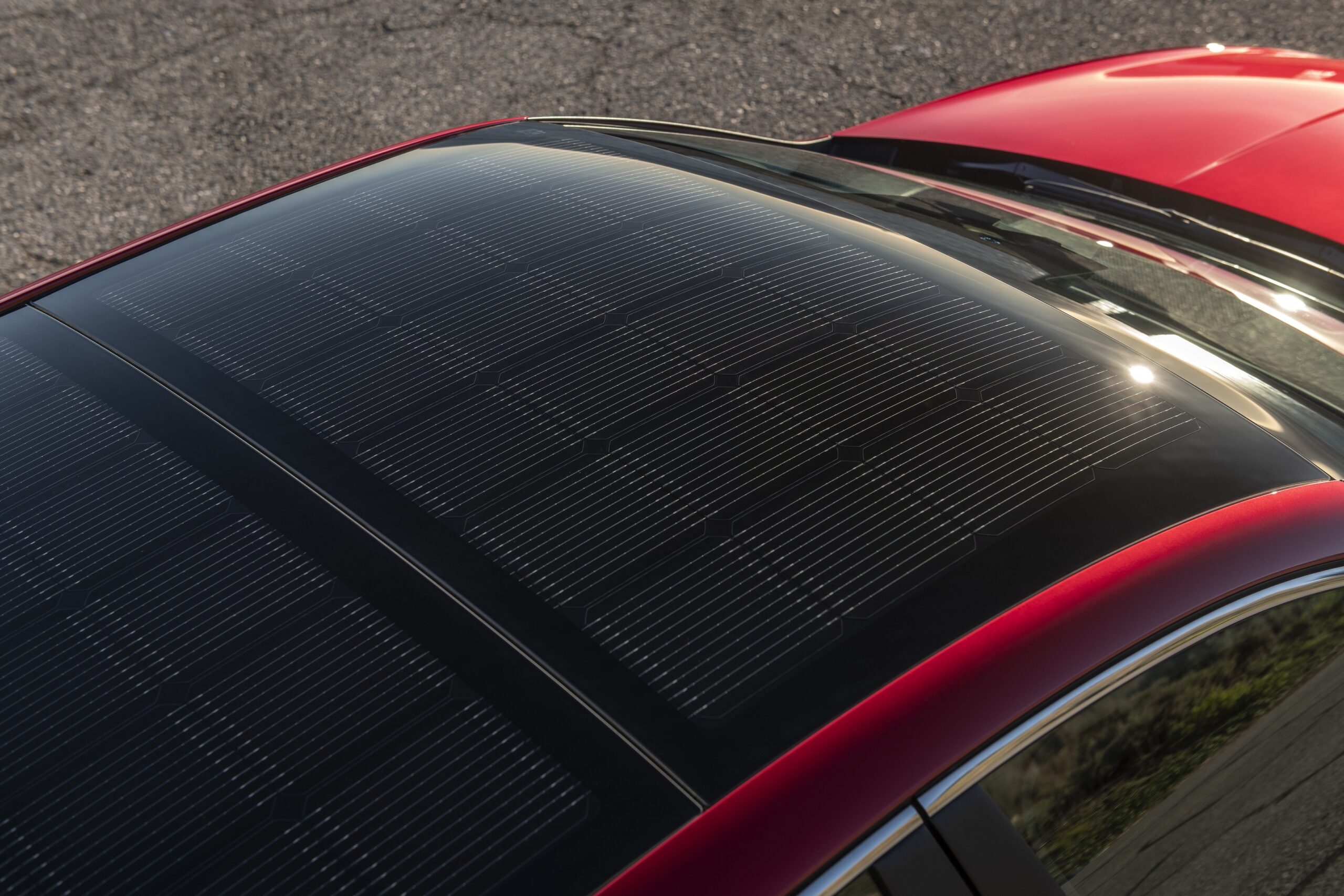 The 205-watt solar roof system trickle-charges the 12-volt and hybrid batteries.