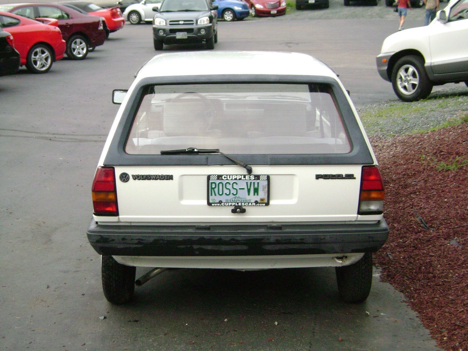 A rear view of the prototype in the dealership driveway