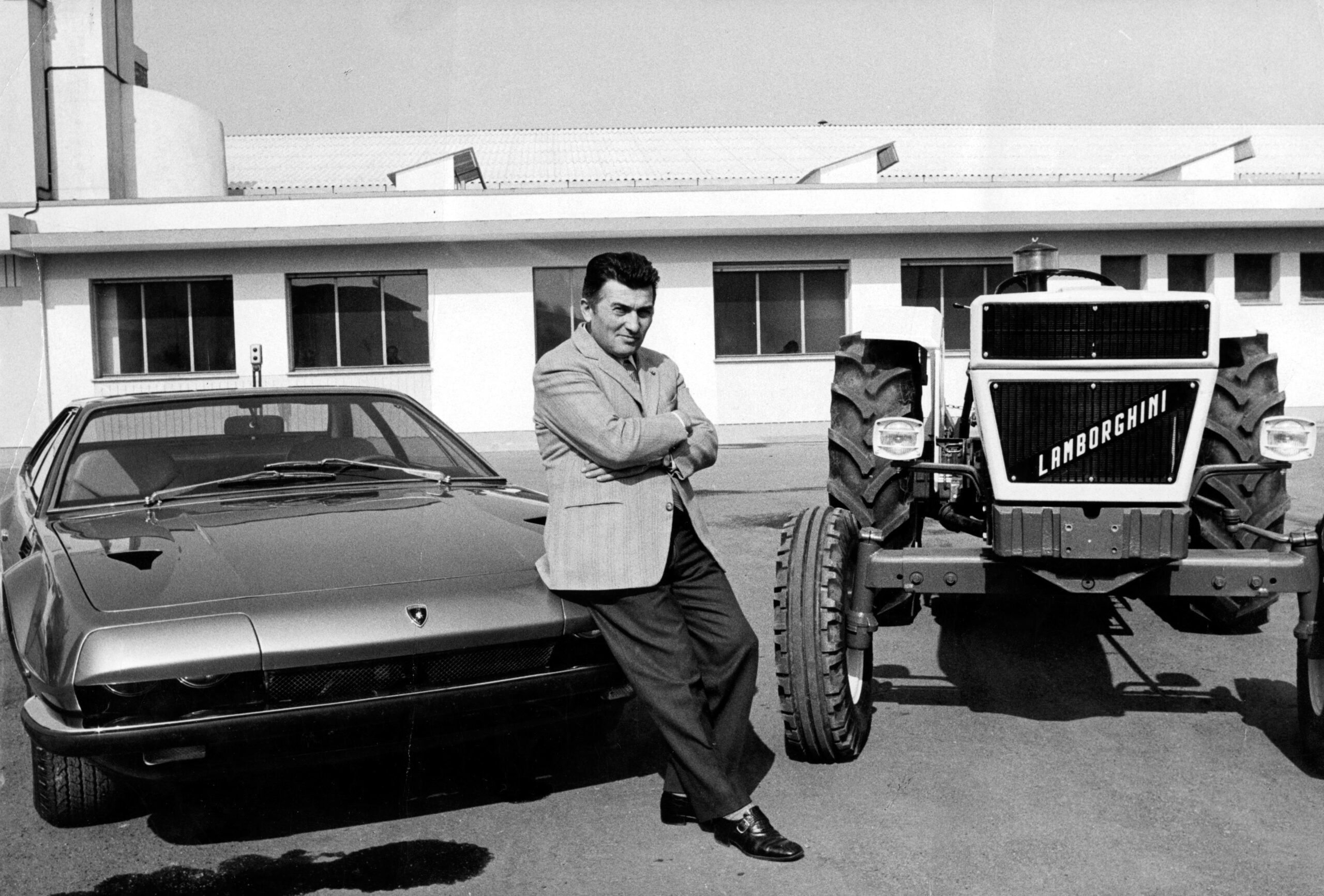 Ferruccio Lamborghini with a car and tractor.