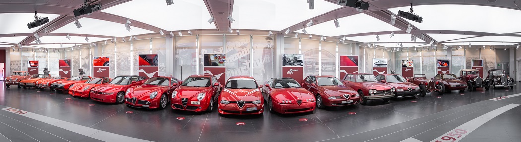 An interior view of cars in the Alfa Romeo museum