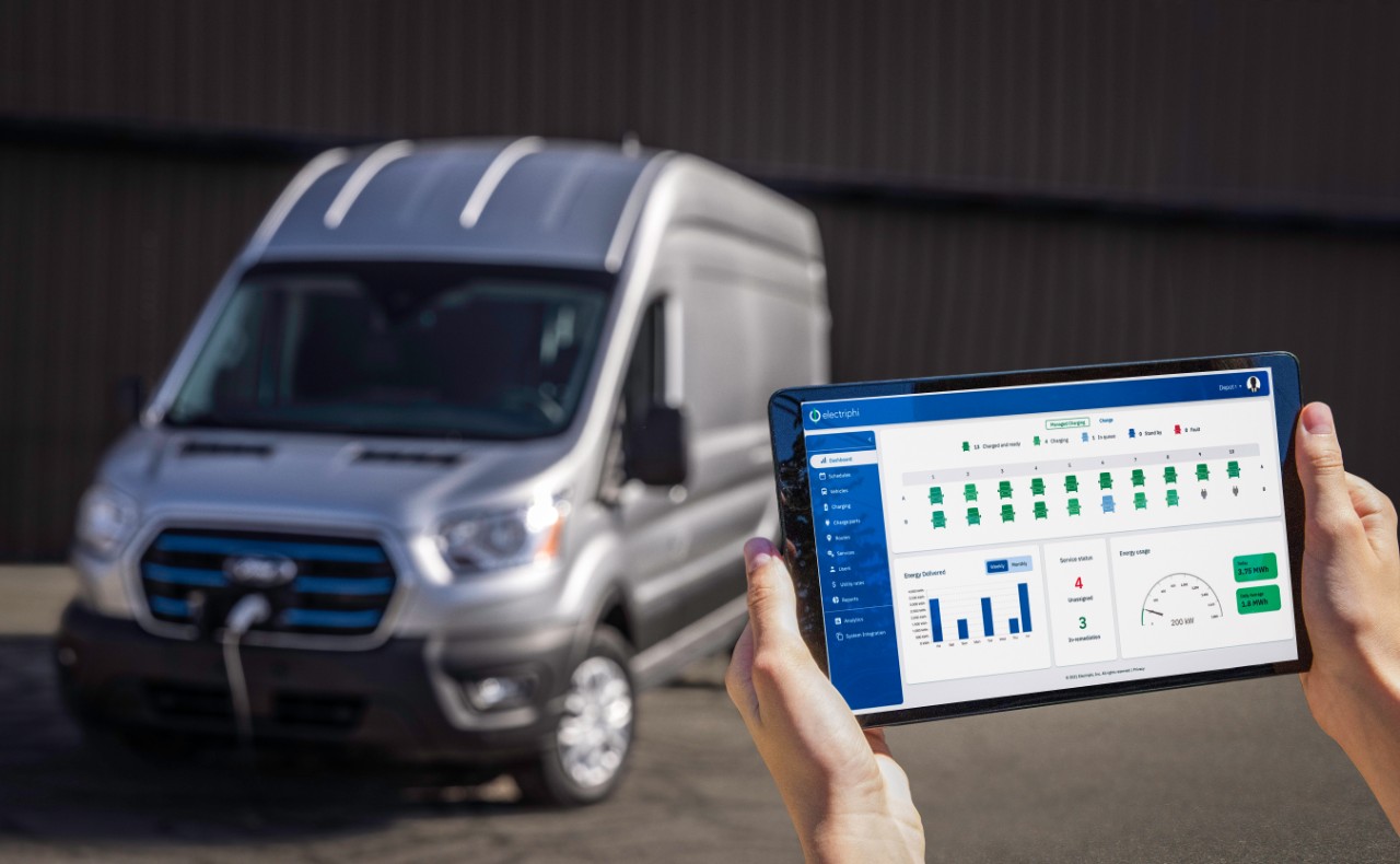 A Ford eTransit work van with a tablet showing charging capabilities