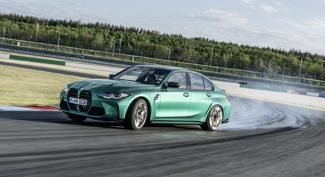 A BMW high-performance drives through a race course