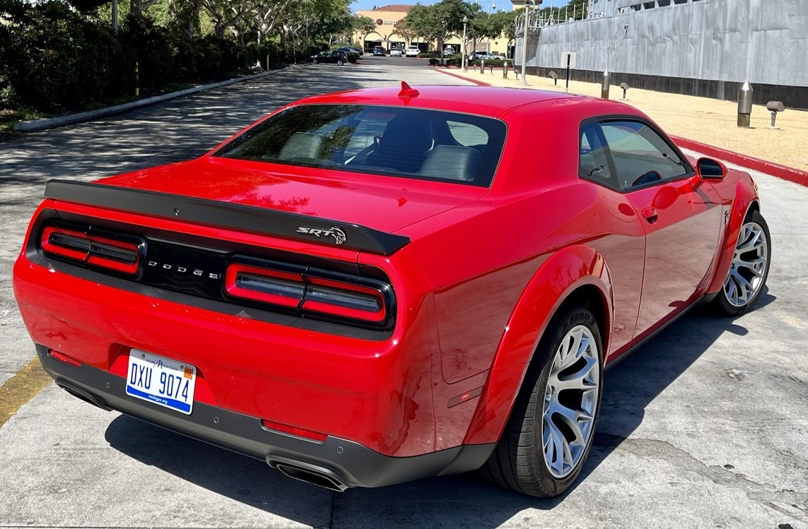 A rear three-quarter view of the red Challenger Jailbreak