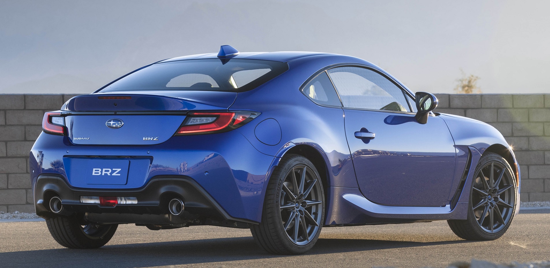 A rear view of a bold, blue BRZ