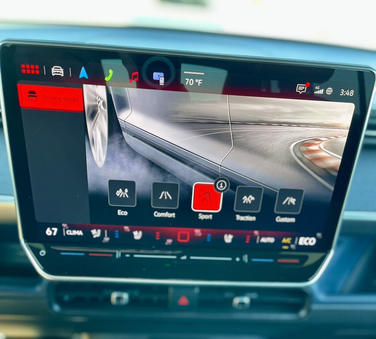 The Sport mode driving screen with red graphics