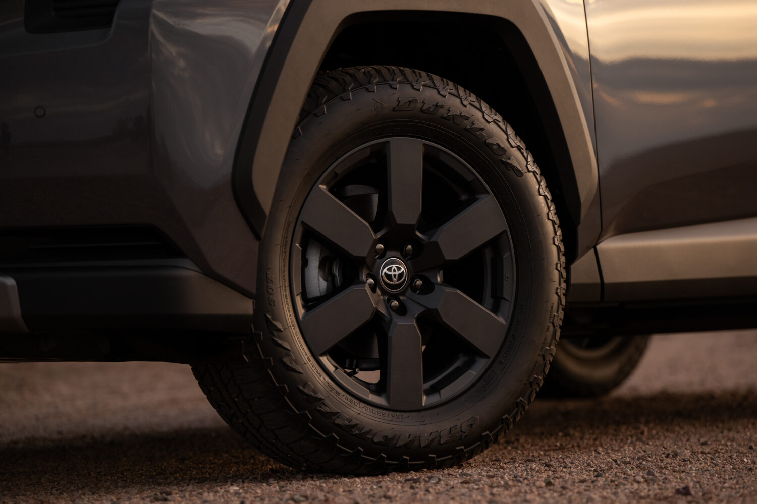 The RAV4 Woodland has Dunlop GrandTrek all-terrain tires on 18-inch matte metallic gray alloy wheels.