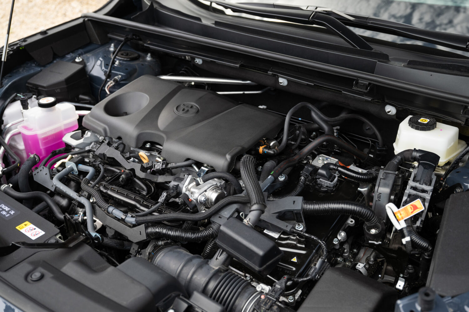 The 2026 RAV4 builds on the 5th Generation Hybrid (HEV) powertrain. It consists of a 2.5-liter inline-four gas engine with two motor-generators. The battery is a sealed lithium-ion of 247.5 volts and 4.1 ampere hour.