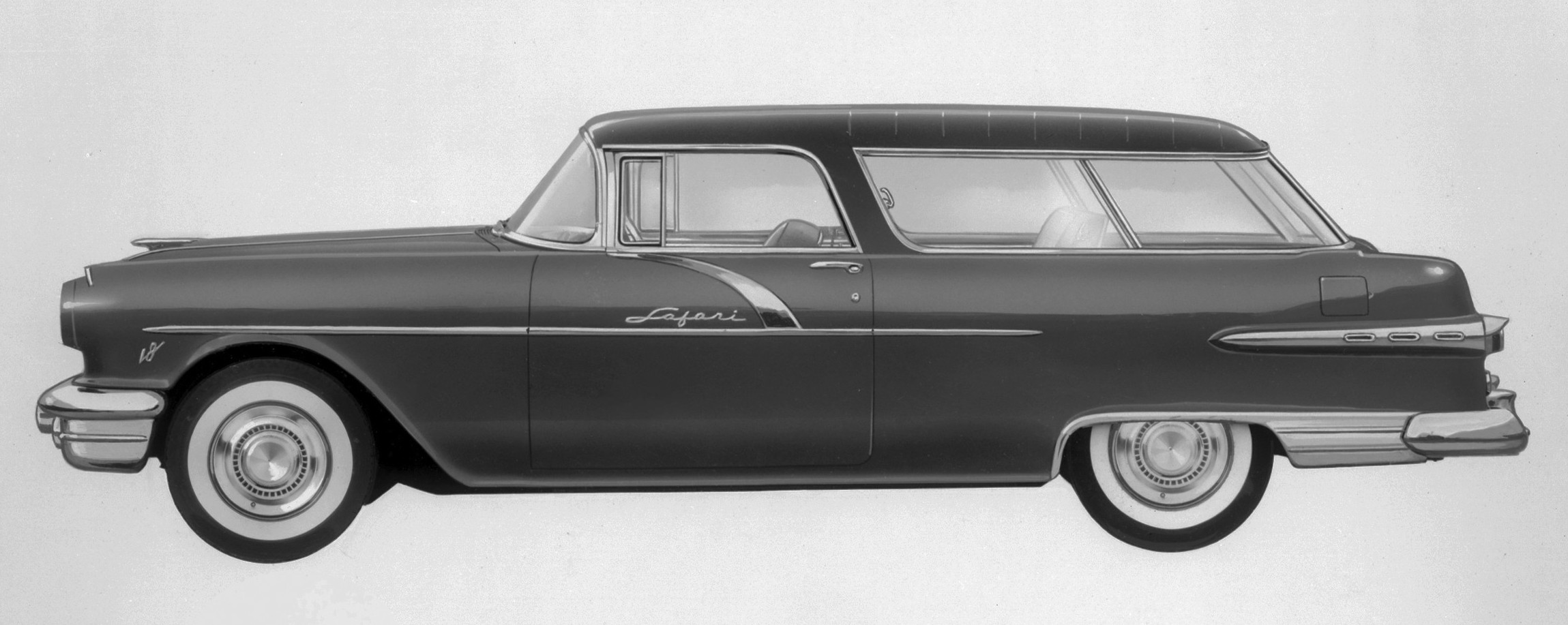 A black and white 1956 Pontiac Safari rendering. A facelift included a more elaborate bumper-grille and the new “Strato-Flight” Hydra-Matic transmission.