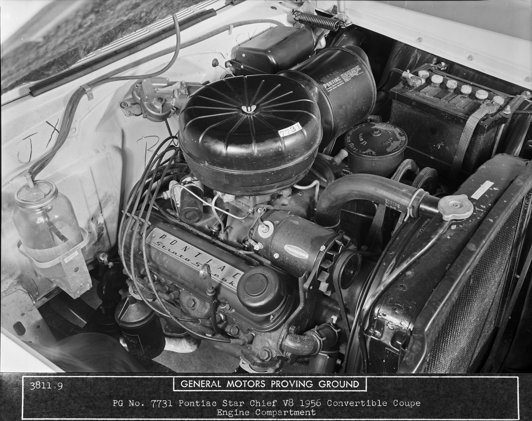 An under-hood view of the 1956 Pontiac Star Chief 317 cubic inch Strato Streak V-8 engine