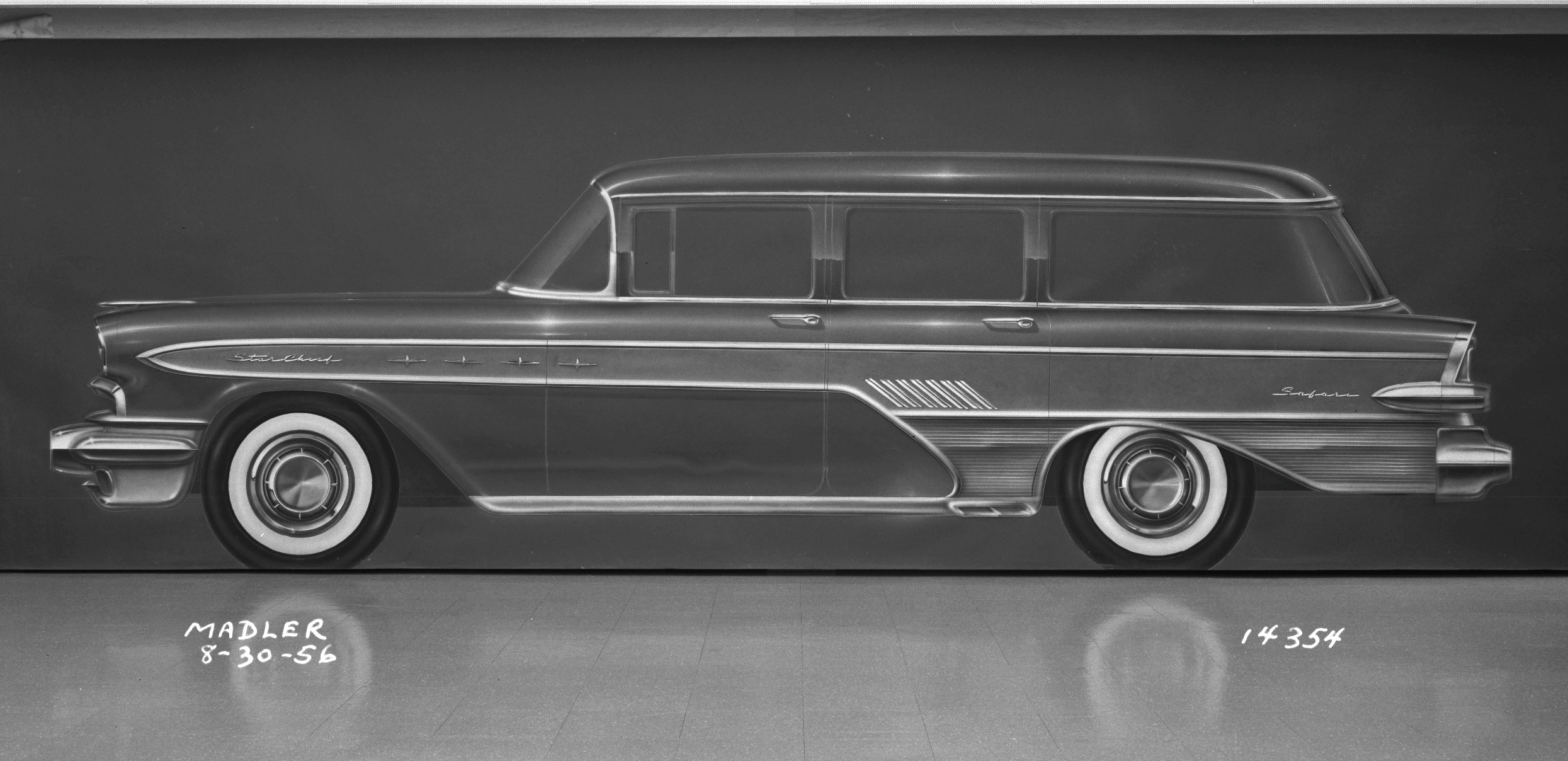 A blackboard rendering of a prototype 1957 Safari Transcontinental four-door wagon.