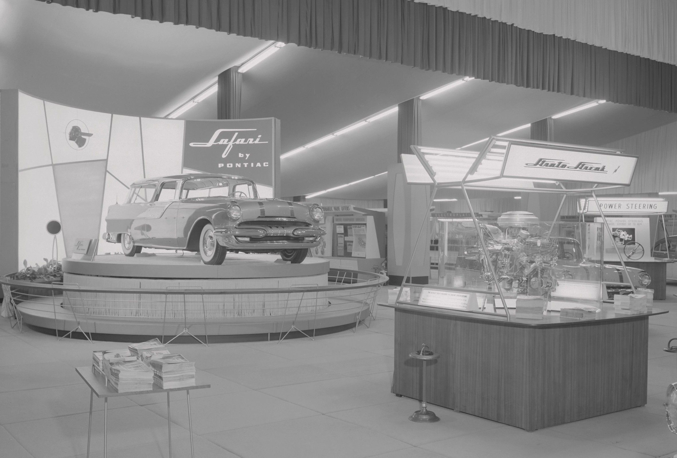 A 1955 auto display shows a Pontiac Custom Safari Station Wagon and the new Strato-Streak V-8.
