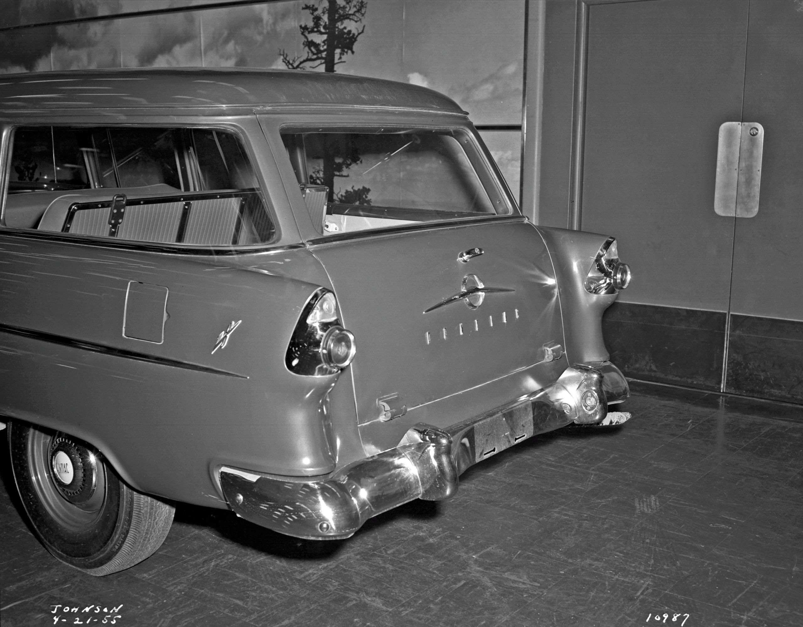 The 1955 Pontiac Chieftain four door wagon with the standard tailgate design.