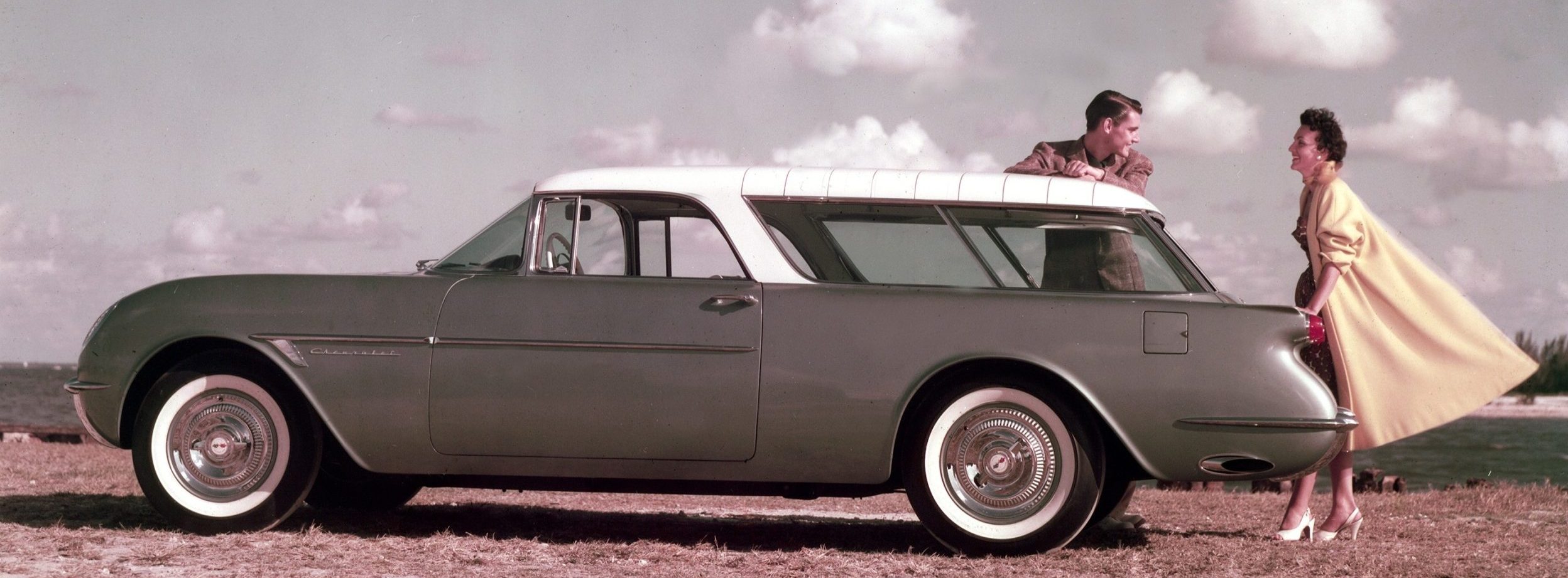 1954 Chevrolet Corvette Nomad Motorama show car_Color exterior with male and female models.