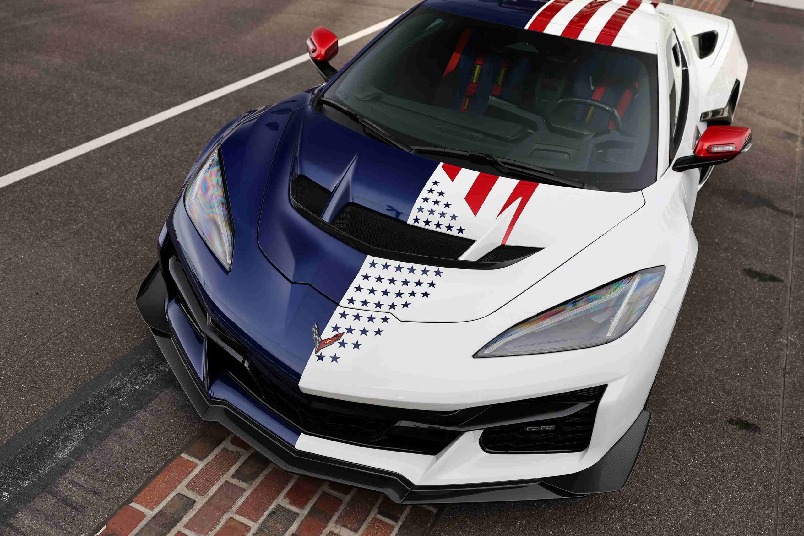 Designed with the Stars and Steel Collection, the pace car is wrapped in stars and stripes decals.