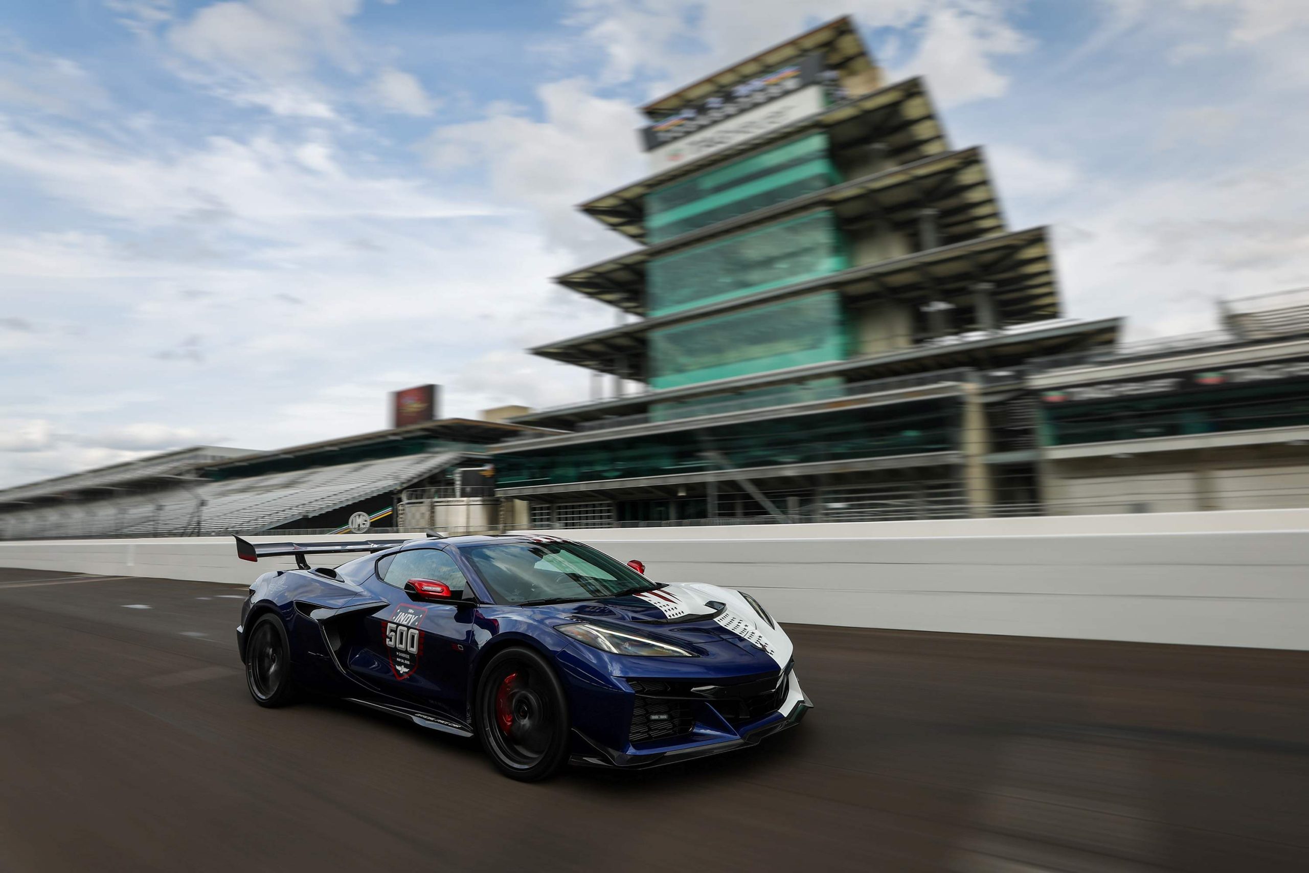 Looking at the 2026 Corvette XR1 pace car passing in front of the pagoda at the Indianapolis Motor SpeedwAy