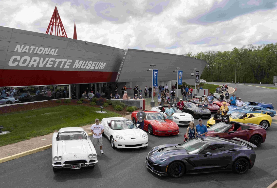 A group of Corvette owners displays a lot of cars out front of the National Corvette Museum in Bowling Green, Ky.