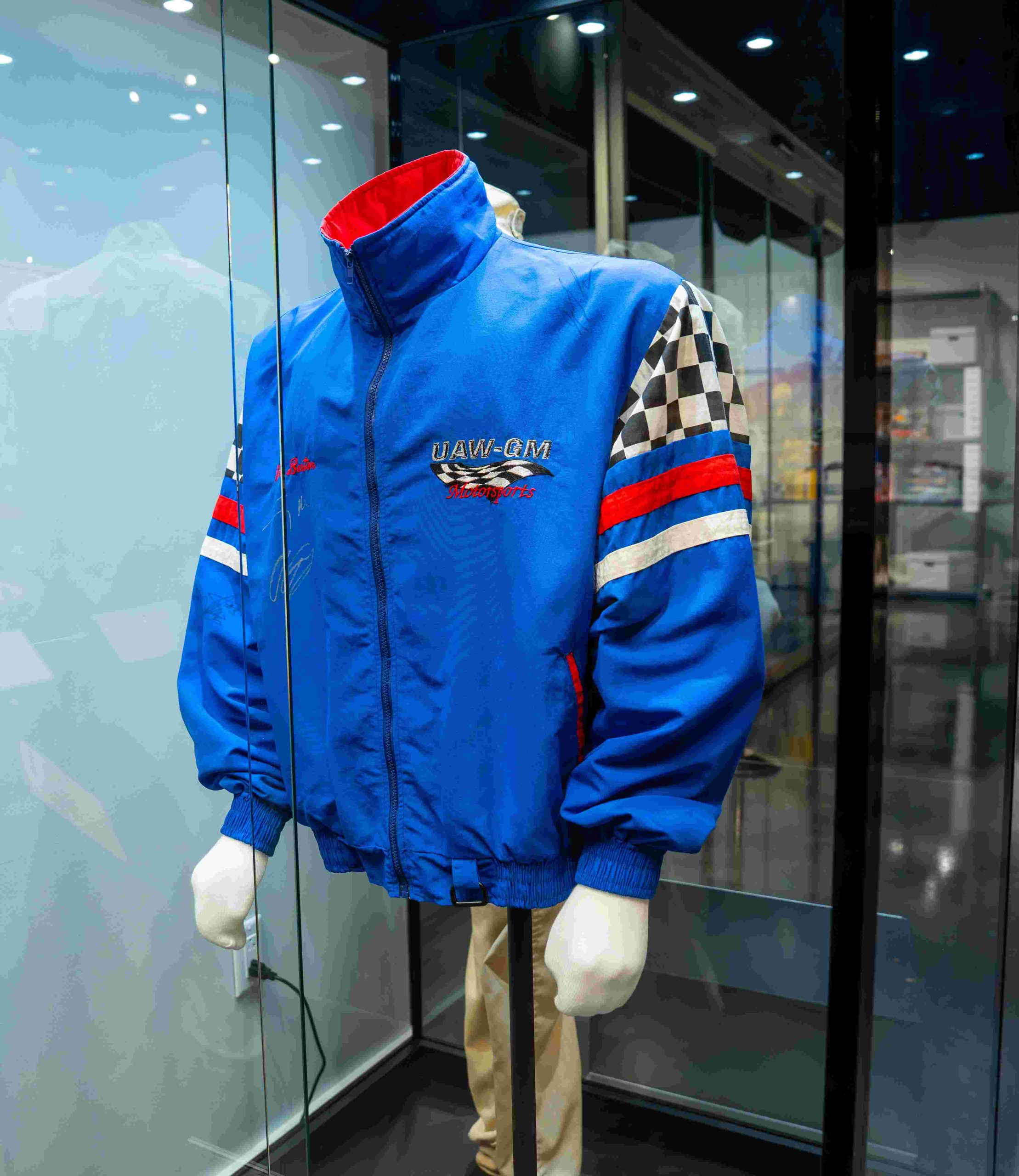 The UAW-GM Motorsports jacket illustrates the intersection of labor, corporate sponsorship, and the personalities of racing.