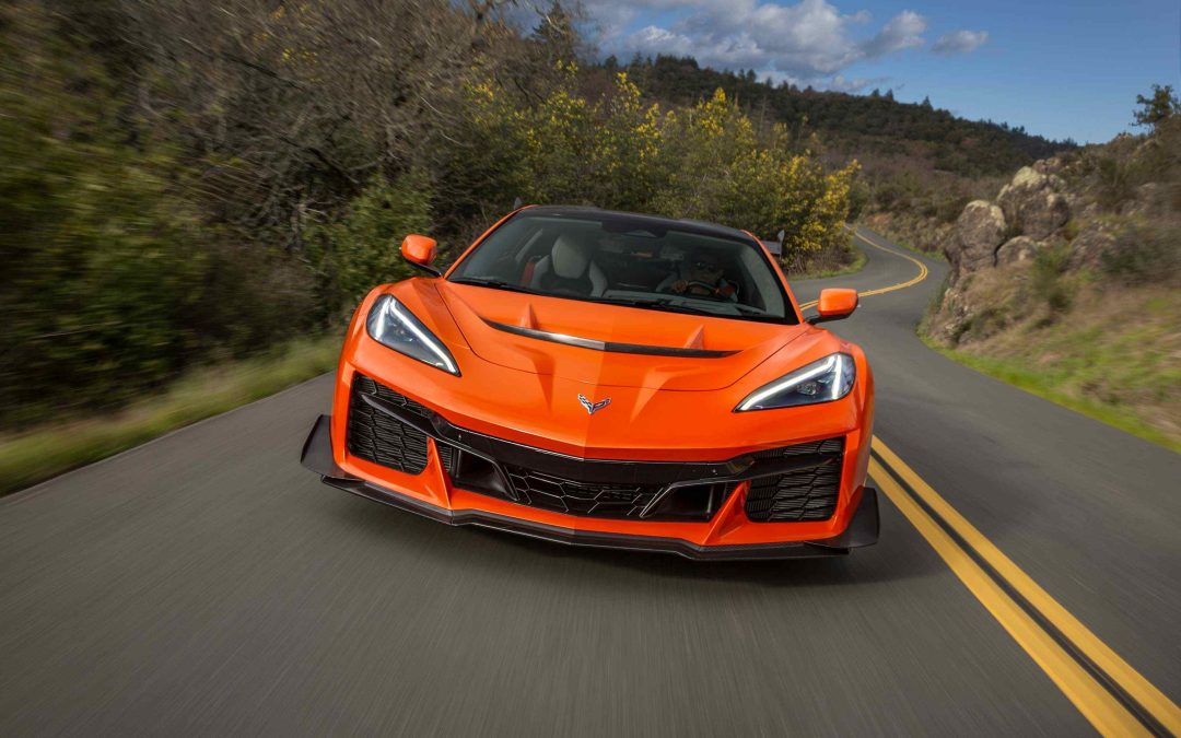 An orange ZR1X on a backcountry road