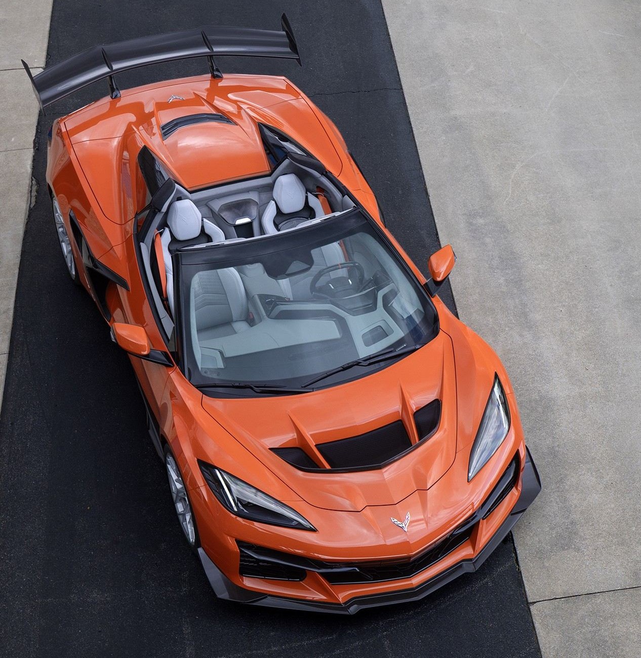 n overhead view of an orange ZR1X on the side of a race track
