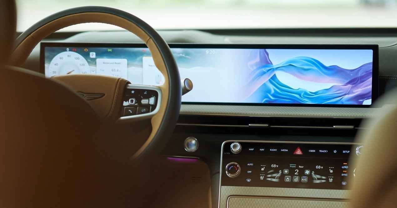 The GV80’s expansive 27-inch OLED screen infotainment display. The system coordinates five specific cabin elements.