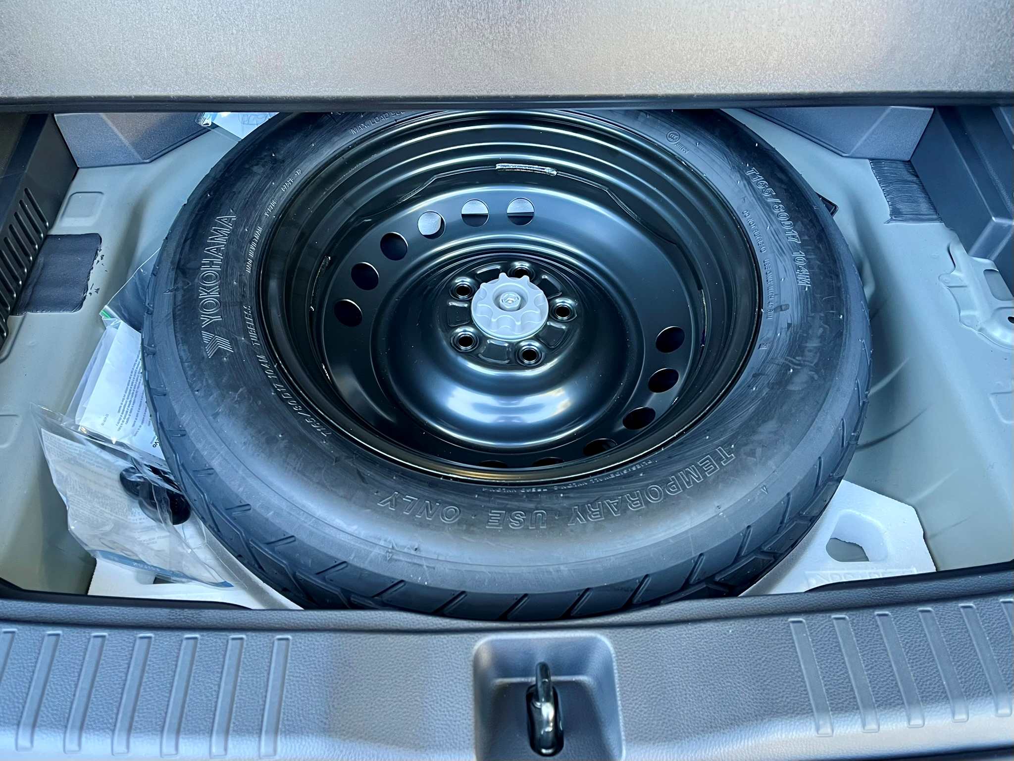 Looking at the 18-inch temporary spare tire under the cargo floor