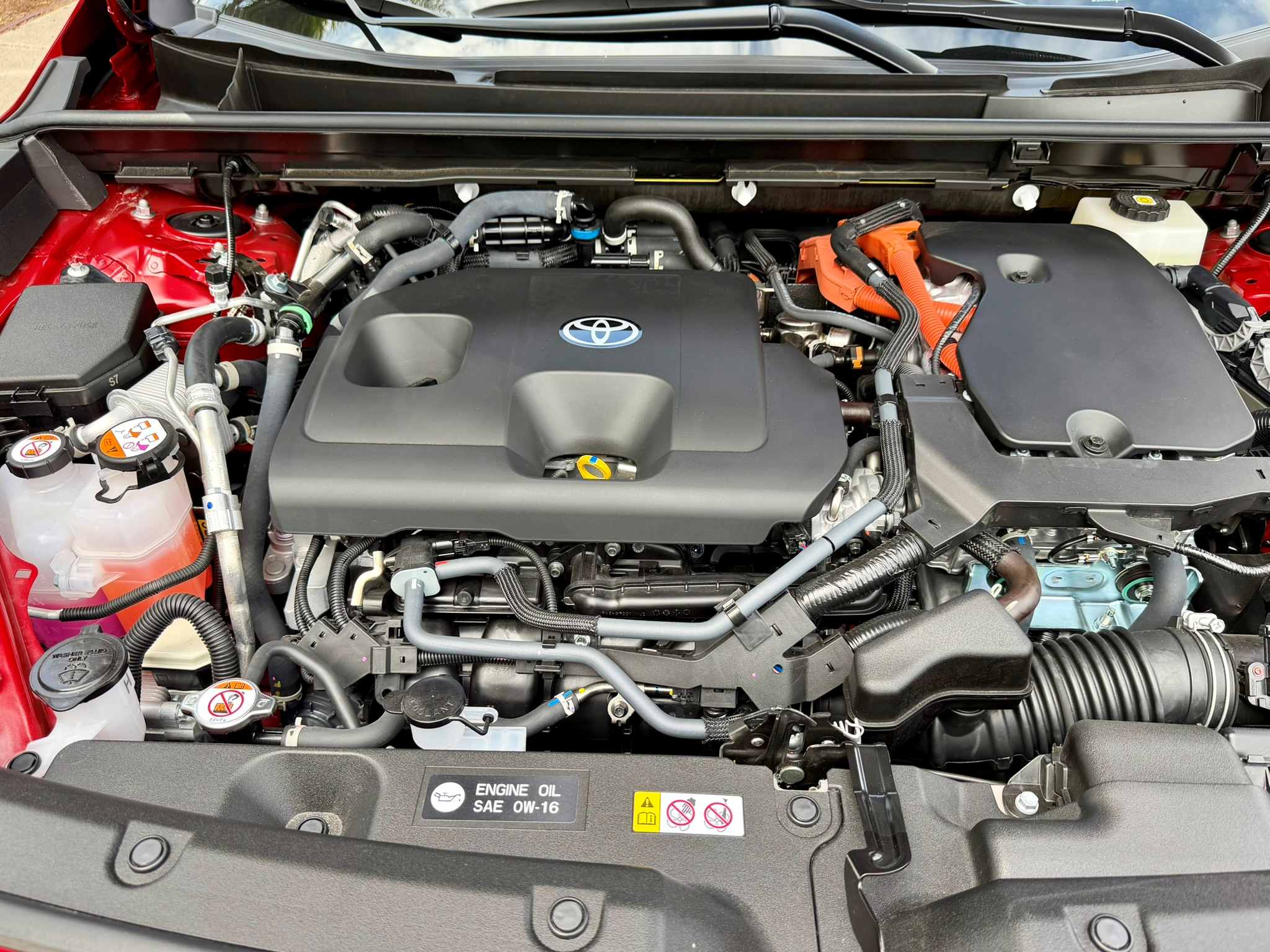 Looking into the engine bay at the RAV PHEV engine.